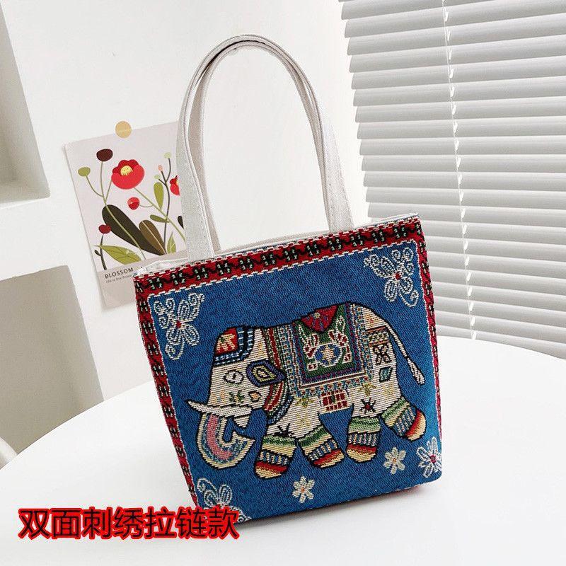 Baby Elephant Double-sided Embroidered Portable Small Bag Women's New Carry-on Handbag Change Mobile Phone Bag