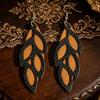 2026 European & American Retro Leather Hollow-Out Geometric Earrings for Women - Simple, Versatile, Creative Design.