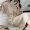 Autunno e inverno dolcevita vintage con bottoni chic gonna maglione a due pezzi Abito in maglia con lacci in vita di qualità.