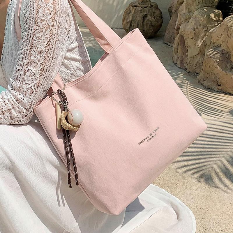 Handbag for Convenient Commuting To Work. High-end and Fashionable Handbag for Storage. Fabric Bag.