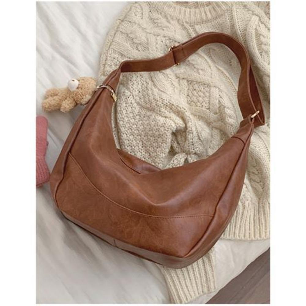 Casual large-capacity bag Autumn and winter female tide retro dumpling bag Korean versatile messenger saddle bag