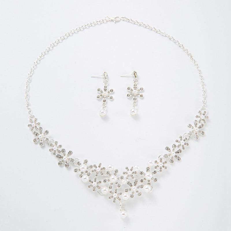 Elegant Pearl and Crystal Jewelry Set: Necklace, Earrings, & Bracelet for Brides