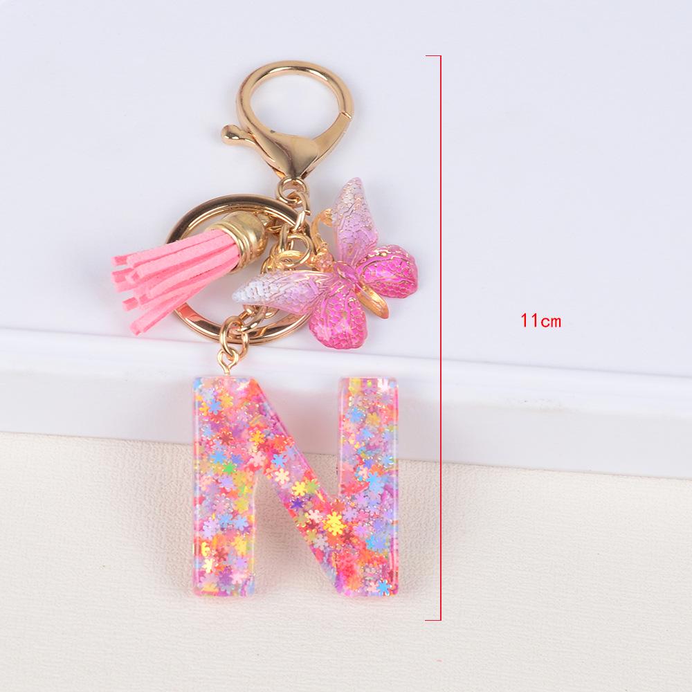 

Розовый брелок с буквой из пайеток и подвески-серьги
