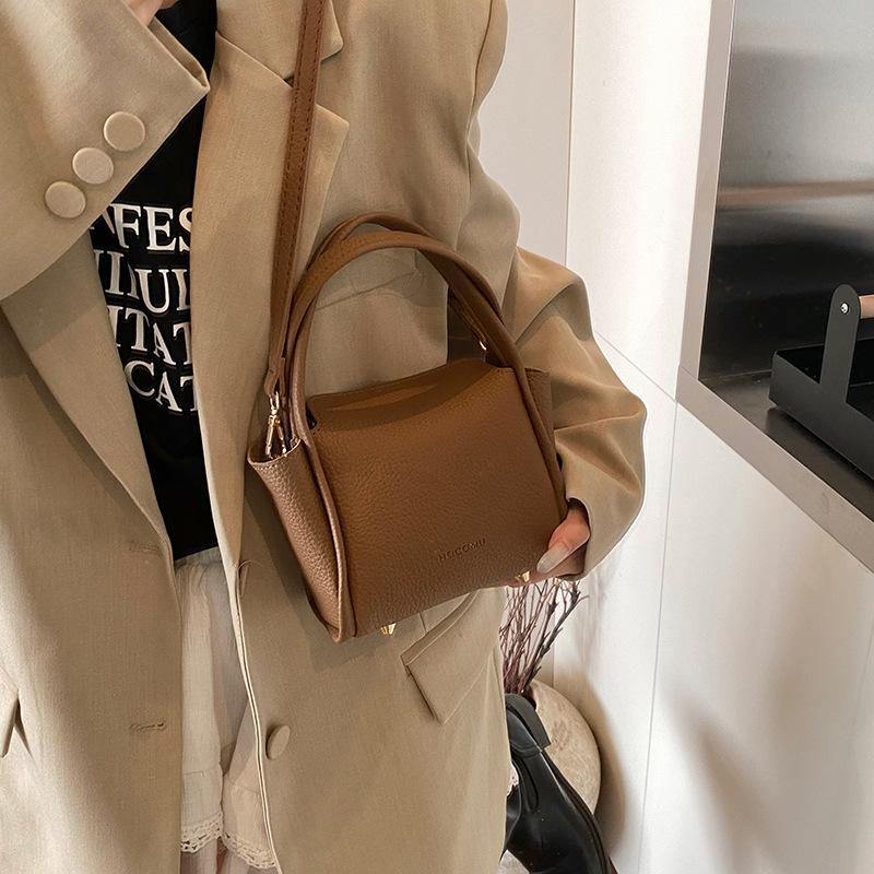 Spring women's bag niche high-end handbag 2025 new simple vegetable basket bag versatile shoulder messenger bag