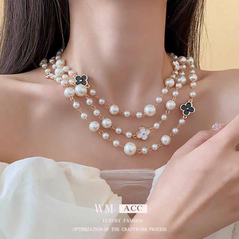 "2024 Light Luxury Pearl Necklace: Elegant Long Sweater Chain for Women, Perfect for Autumn & Winter"