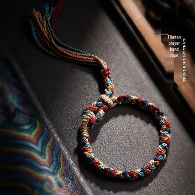 Bracciale Tibetano a Cordino Regolabile Intrecciato a Mano a Cinque Colori con Nappa