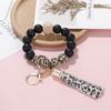 Elegant Silicone Bead Keychain Bracelet with Leather Tassel - Women's European and American Style