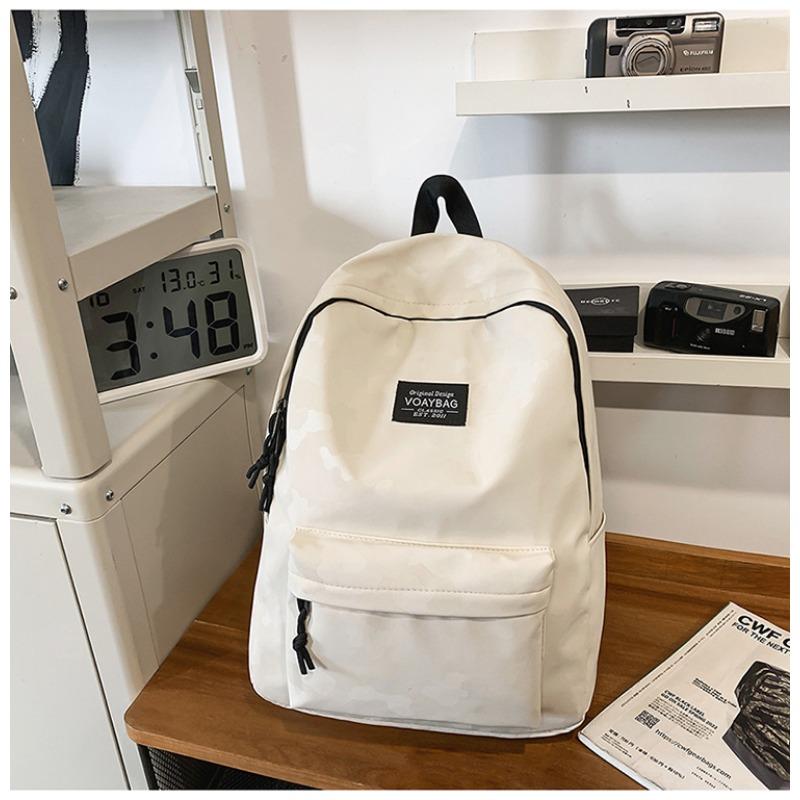 Simple and Versatile Backpack On Campus  High School Students' Large Capacity Leisure  Light Shoulders for Men and Women.