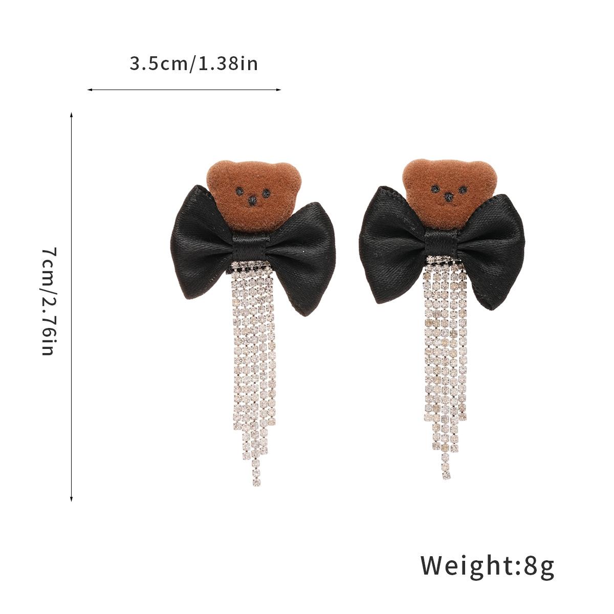 

Silver Needle with Diamonds, Flocking Bow, Bear Fringed Earrings, Light Luxury, High-end Stud Earrings, Trendy Design, Temperament Earrings.