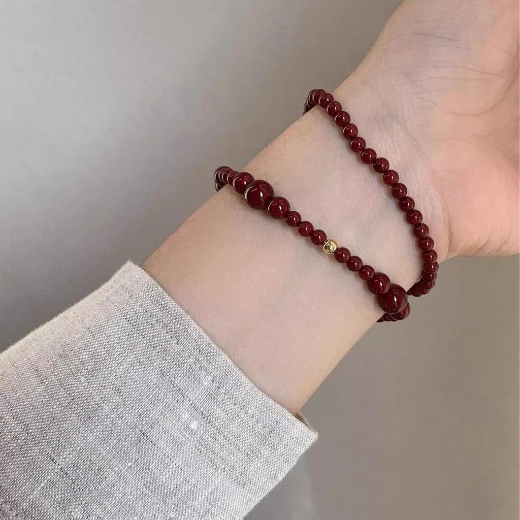 Rizhao Xiangjiang Vermilion Red Beaded Bracelet: New Chinese Style, Exquisite Layered Design.