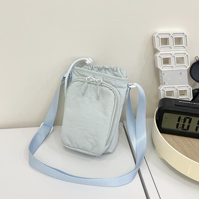 Crossbody bag women's new Korean version of simple solid color small square bag casual versatile mobile phone bag student water cup bag tide