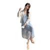 Popular beautiful suit skirt vacation style suspender dress two-piece set fringed hollow long dress suspender skirt