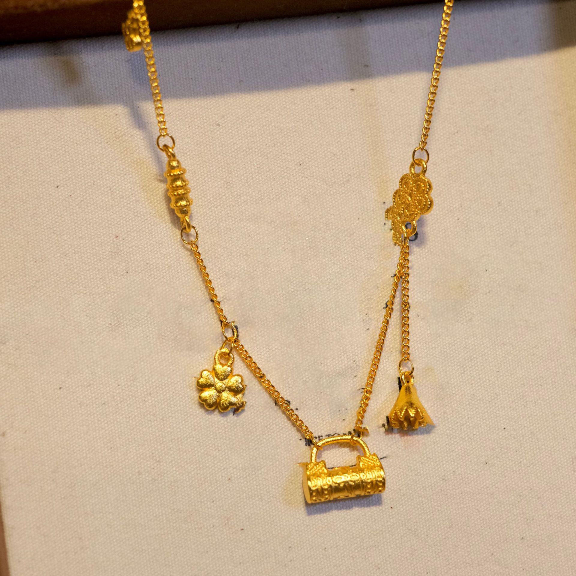 

Ожерелье с замком безопасности в виде цветка, роскошное, с высоким чувством стиля, цепочка на ключицу, темпераментная, универсальное украшение