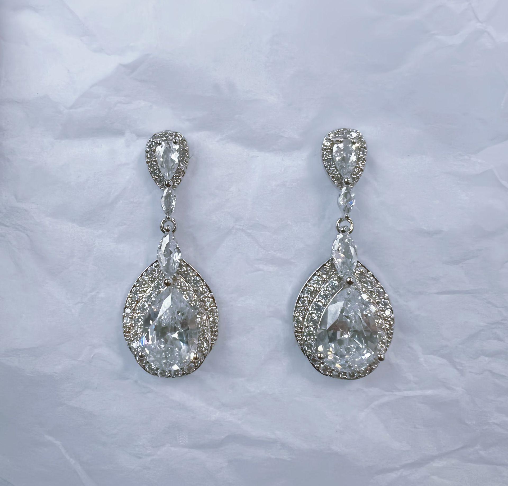 Elegant Long Teardrop Zirconia Dangle Earrings for Evening Wear and Brides