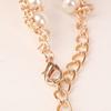 Cintura regolabile con perle e catene metalliche per donna