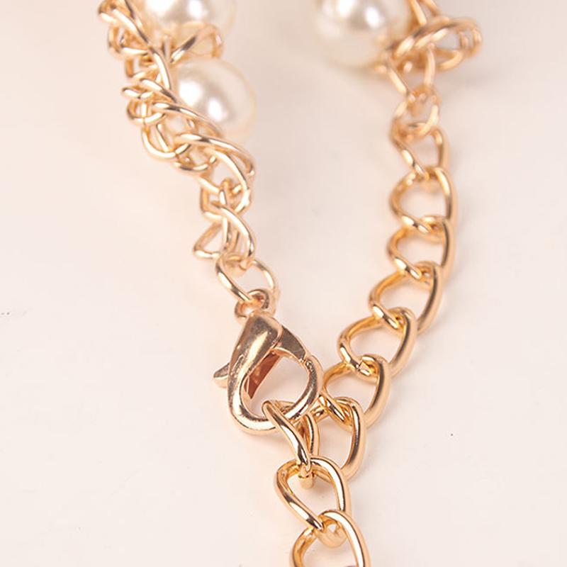 Cintura regolabile con perle e catene metalliche per donna