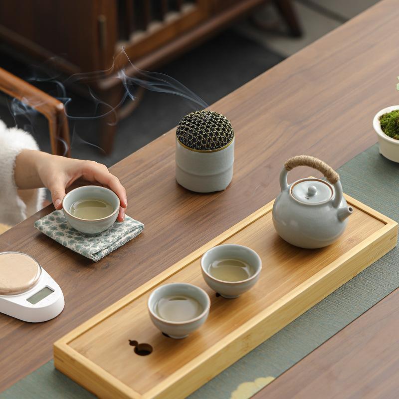 Dehua travel kung fu tea set small set household simple teapot ceramic teacup outdoor tea tray portable bag