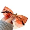 European and American new street photography frameless sunglasses women's hollow metal frames advanced cat glasses sunscreen sunglasses