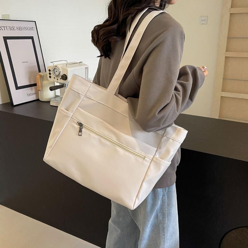 

Женская сумка через плечо 2026 Новая Универсальная Большая Вместительная Сумка-тоут Повседневная Однотонная Модная Простая Для Поездок Сумка покинуть белый