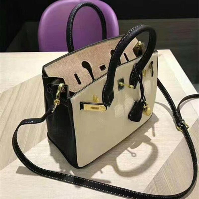 New color matching platinum bag first layer cowhide o fashionable shoulder portable commuter women's bag casual leather bag