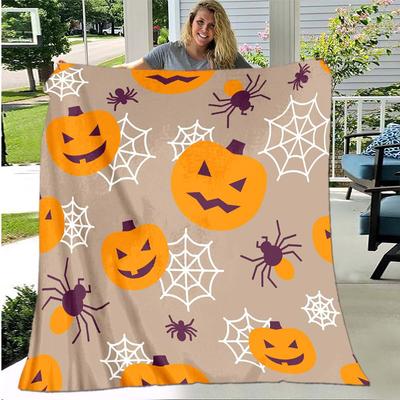 Couverture douce en polaire imprimée numériquement avec un fantôme et une citrouille, idéale pour Halloween. Convient également pour les canapés et les lits.