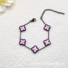 New Four-Leaf Clover Bracelet: Light Luxury, Simple Black & Colorful Stainless Steel Multi-Flower Jewelry, Fade-Resistant, Versatile Fashion Piece