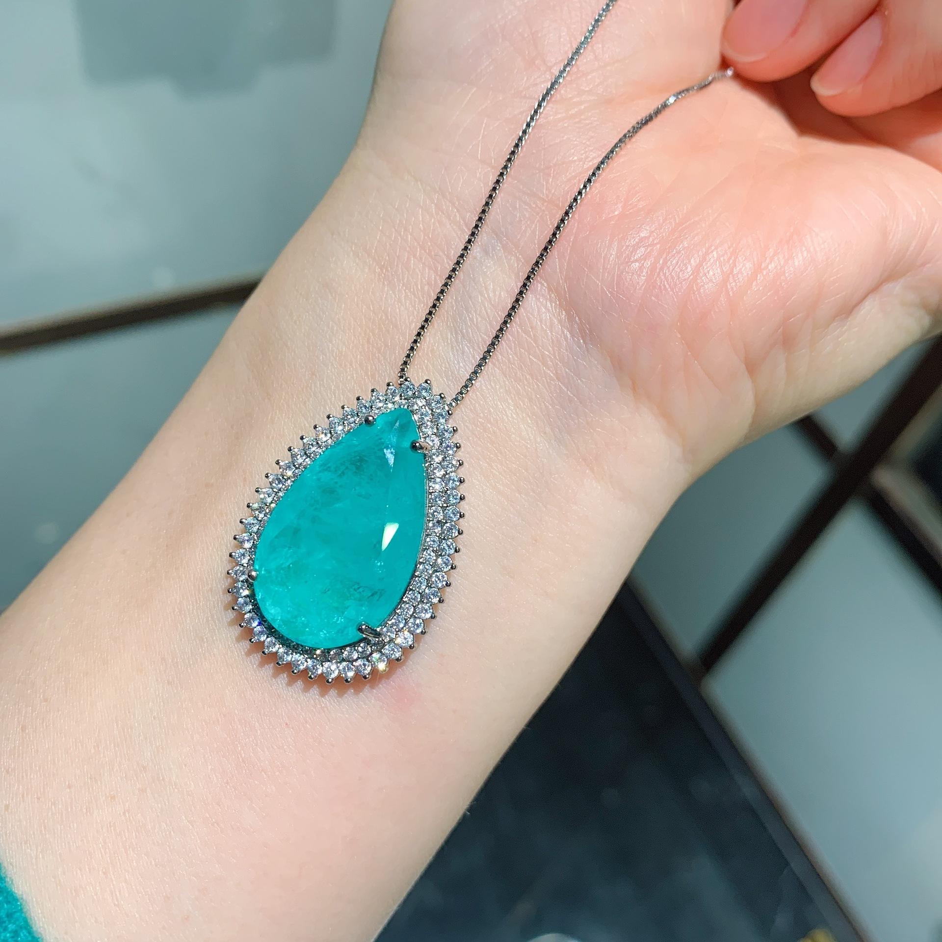 

Ювелирные изделия Параиба Серьги Ожерелье Ювелирный набор Серьги-пусеты 8 * 16 Подвеска 15 * 25 Ювелирные изделия