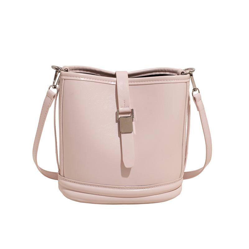 Korean new product, sweet and light color, gentle wind temperament bucket bag, women's commuting versatile and advanced messenger bag