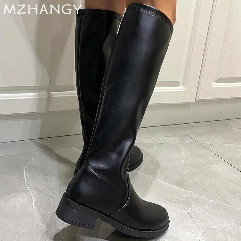 Модные женские кожаные высокие сапоги — фото 6