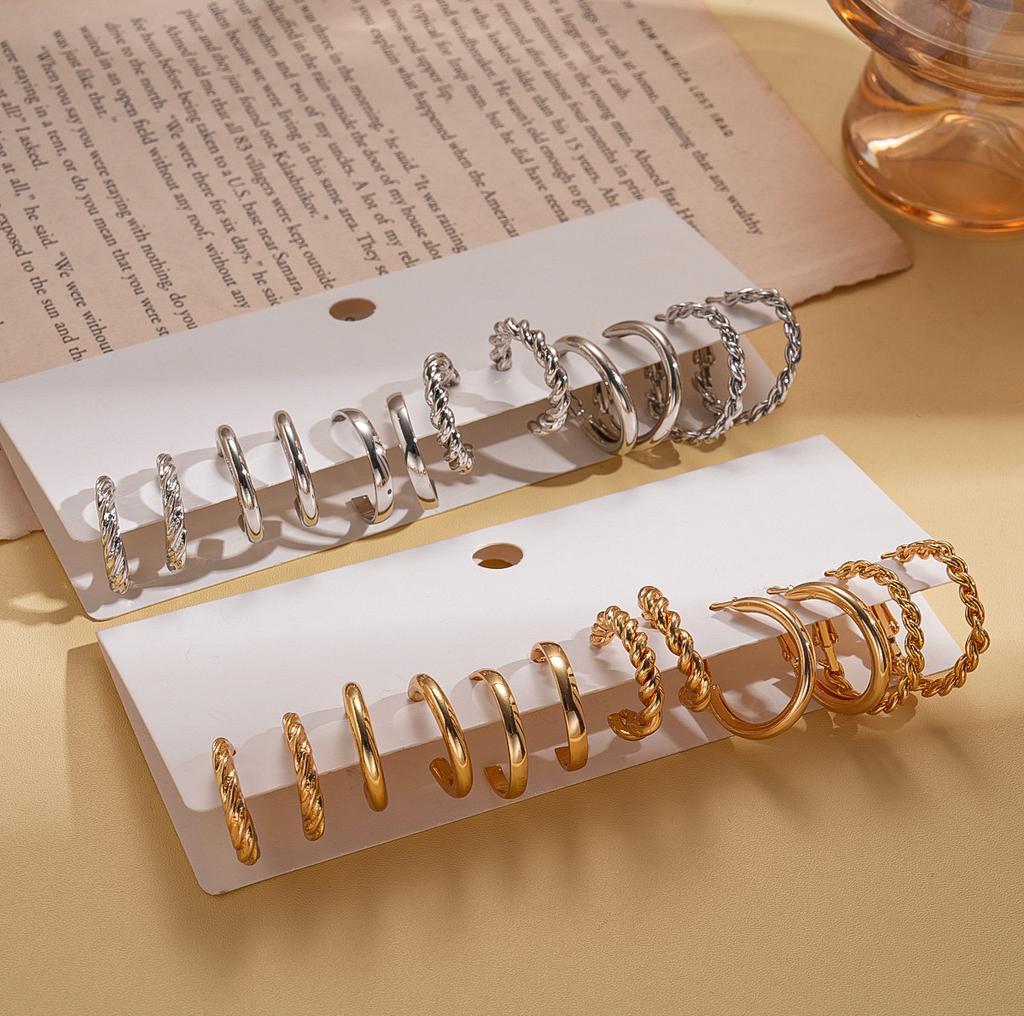 Twelve-piece geometric round twisted silver needle stud earrings fashionable commuter earrings