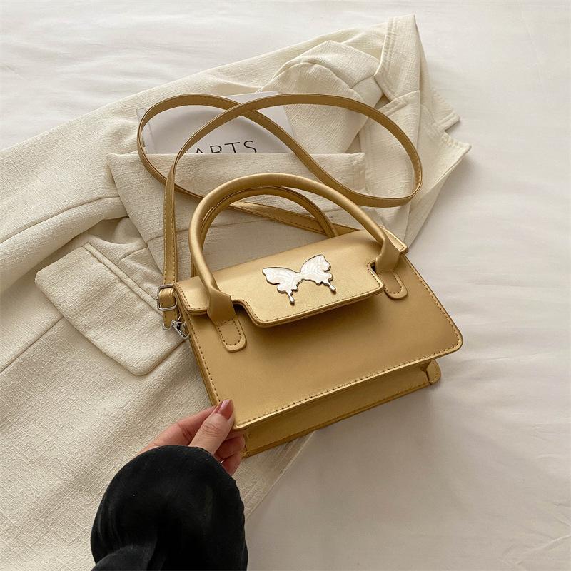 

Літо 2024, новий простий повсякденний рюкзак Корейська версія нішевої модної сумки жіночий естетичний тренд повсякденний рюкзак золотий