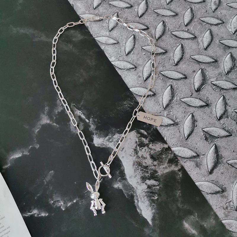 European & American Minimalist Cross Layered Necklace with Movable Rabbit Pendant - Unisex Trendy Sweater Chain