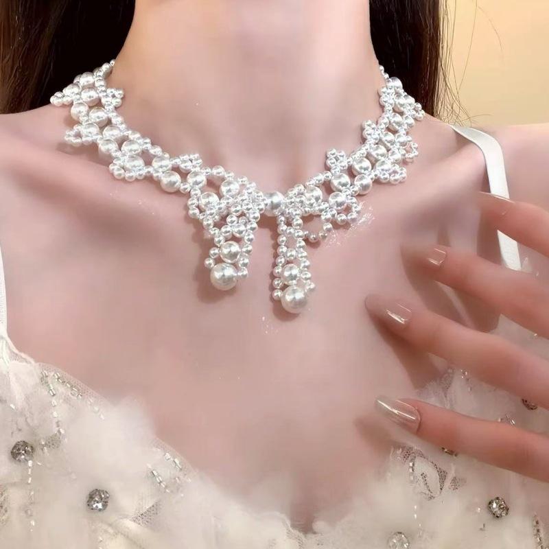 Handmade Pearl Necklace with Bow Clavicle Chain - Light Luxury Design for Women