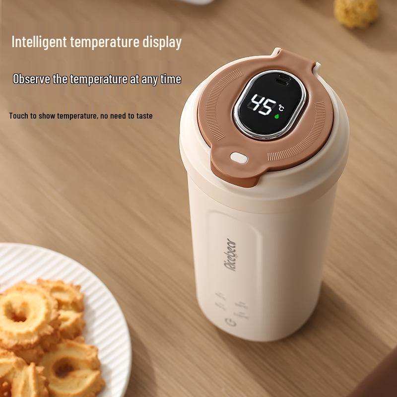 Portable Mini Smart Electric Kettle and Insulated Water Cup with USB Charging for Travel.