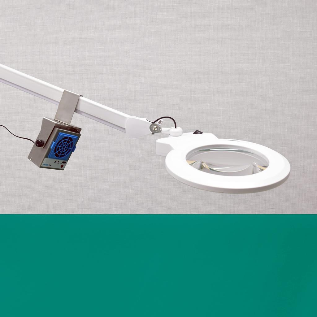This is an adapter for attaching the HOZAN arm mount adapter to an arm F-94 magnifier. F-94-2