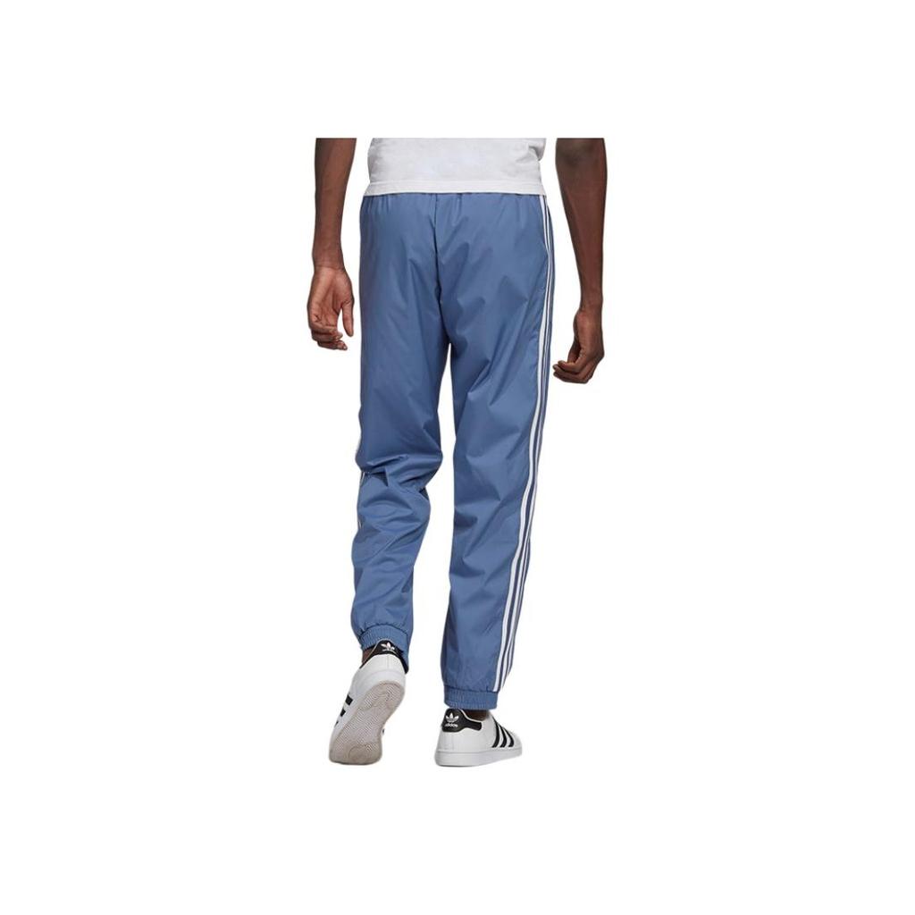 adidas Originals Gestreifte Lässige Sporthose mit Bündchen Herren Unterteile Blau GN3534