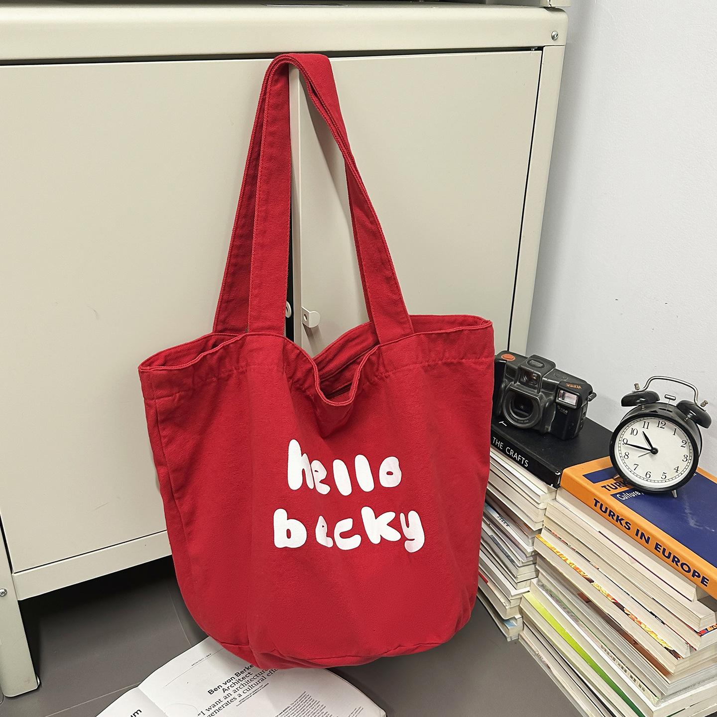 

Korean version of the new canvas bag large capacity shoulder letter tote bag ins simple leisure commuter shopping bag women s bag single package красный