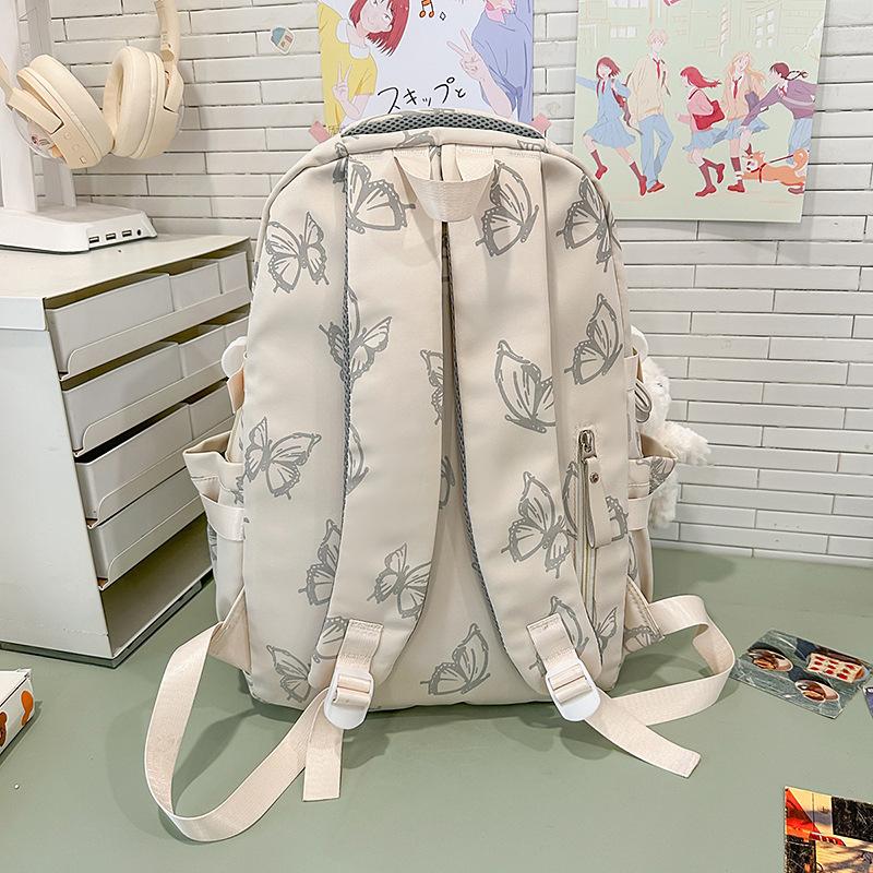 Schoolbag Soft light Cool atmosphere Milk white butterfly full print schoolbag Junior high school students Daily commute Lightweight versatile