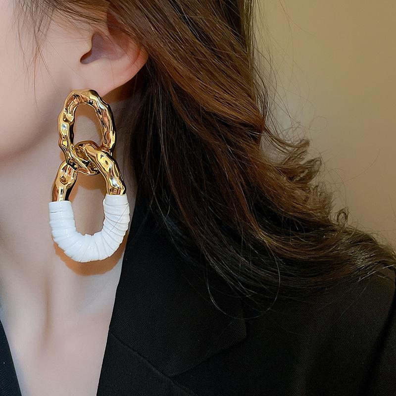 Oval twist pleated fringed earrings niche design earrings fashion simple versatile earrings women