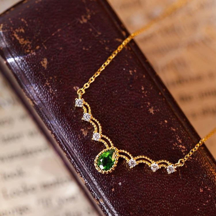French Exquisite Green Zircon Pendant Necklace on S925 Sterling Silver, 18K Gold-Plated Clavicle Chain with Green Silk Ribbon 18K Gold