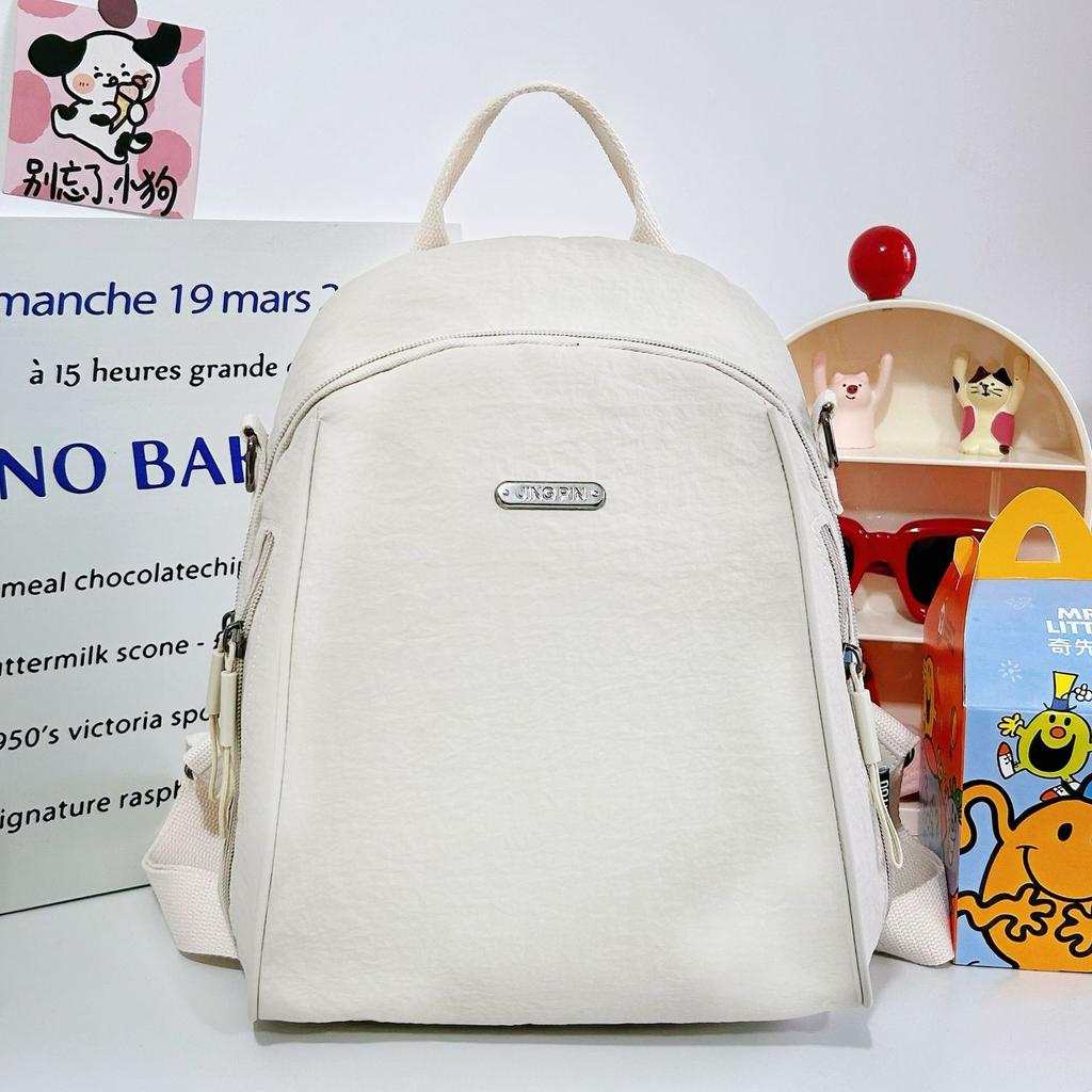 Versatile solid color women's backpack large-capacity leisure bag simple backpack light schoolbag light luxury student bag commuter bag