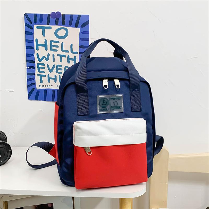 Girls casual small backpack Korean version of Harajuku high school female middle school student ins Japanese contrasting color backpack female