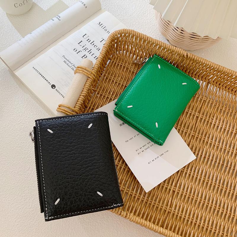 Korean version of women's wallet ins women's small wallet women's high-end short wallet change bag solid color zipper hand-held