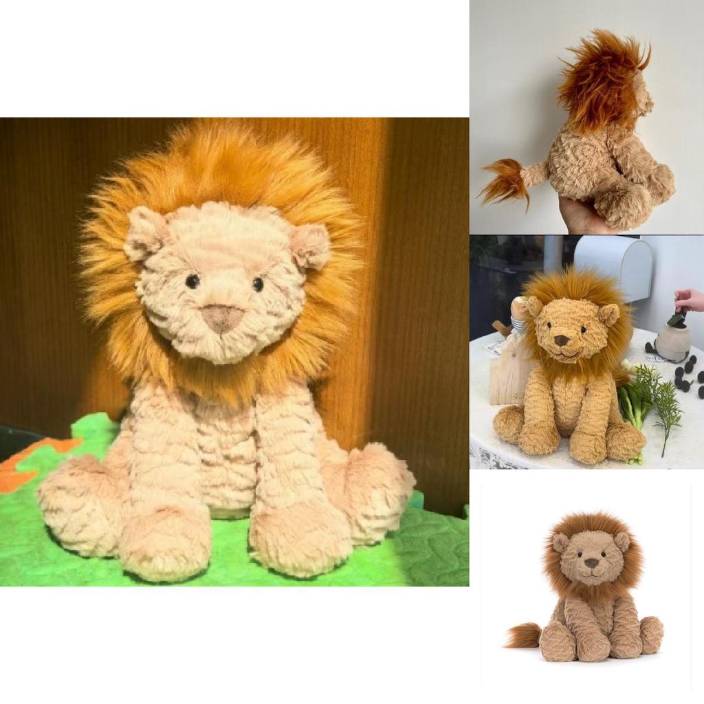 León de peluche con pelaje ondulado, ideal como regalo para niñas y para coleccionistas.