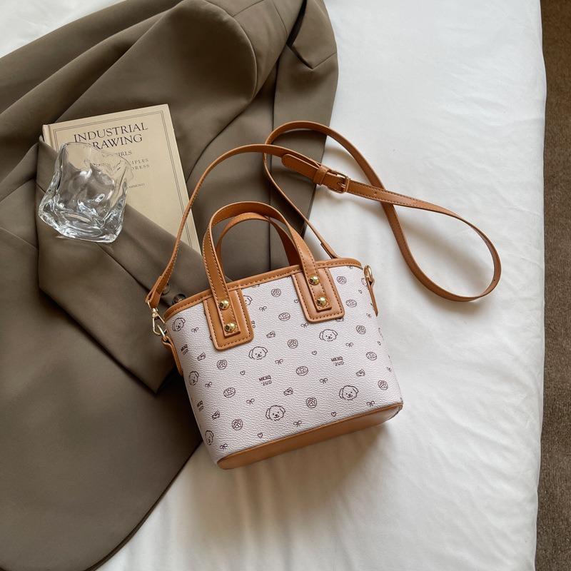 Hand-Eimer-Tasche mit Cartoon-Bärendruck, modische Umhängetasche, neue High-End-Umhängetasche