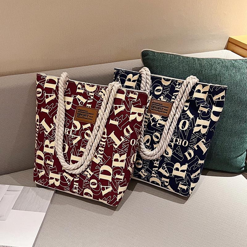 2025 Women's Korean Style Fashion Tote: Large Capacity Canvas Shoulder Shopping Bag with Print Design