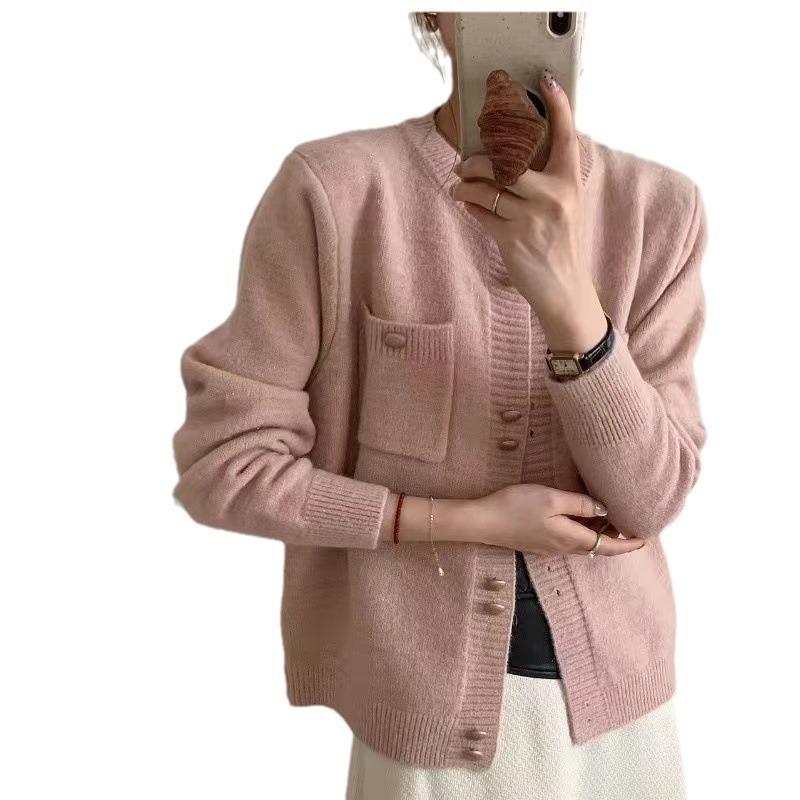 Real autumn and winter new gentle wind double-breasted design sense pocket knitted cardigan women's solid color crew neck sweater jacket