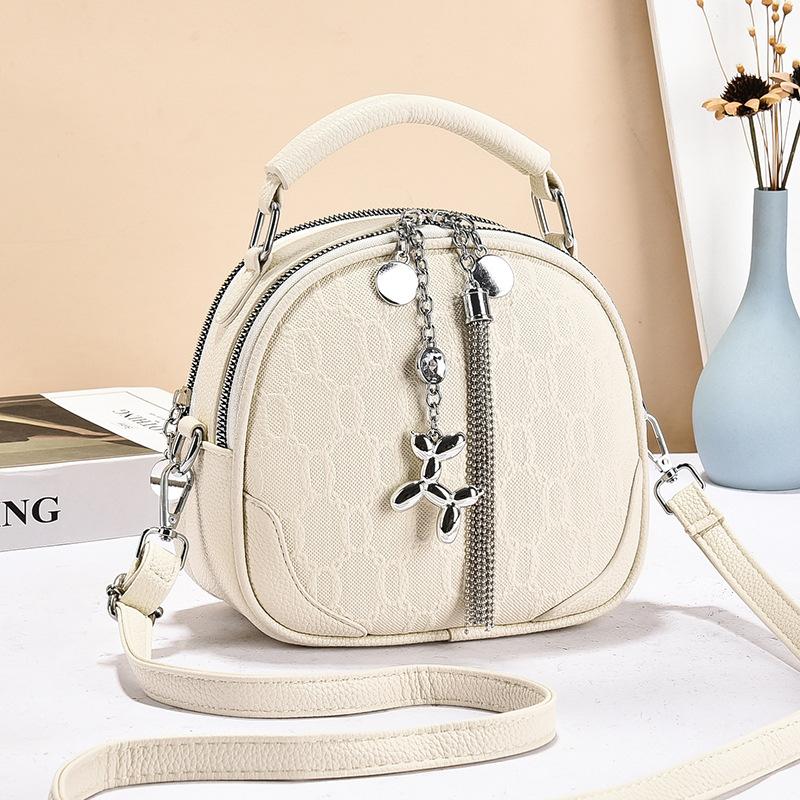 

Simple and fashionable single shoulder portable messenger bag autumn and winter exquisite small round bag women s multi-layer fringed bag білий