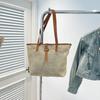 Korean version of the new product niche design Mori hollow straw woven tote bag large capacity casual versatile single shoulder mother and child bag w