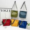 Large-capacity Bag Women's Spring and Summer New Retro Broadband Shoulder Messenger Bag Premium Texture Commuter Bucket Bag